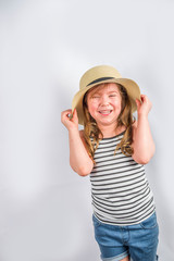 Summer vacation and holiday concept. Cute little smiling girl in a summer hat with sunglasses. Background for vacation banner, mockup