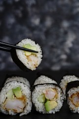 Homemade shrimp tempura sushi roll, selective focus