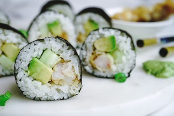 Homemade shrimp tempura sushi roll, selective focus