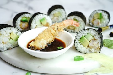 Homemade shrimp tempura sushi roll, selective focus