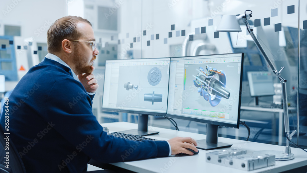 Poster Male Industrial Engineer Solving Problems, Working on a Personal Computer, Two Monitor Screens Show CAD Software with 3D Prototype of Hybrid Electric Engine Being Tested. Working Modern Factory
