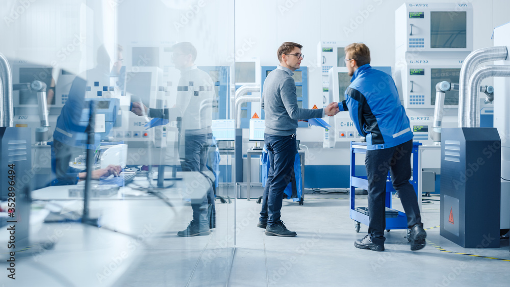 Poster inside modern factory in facility workshop professional workers using high-tech industrial cnc machi