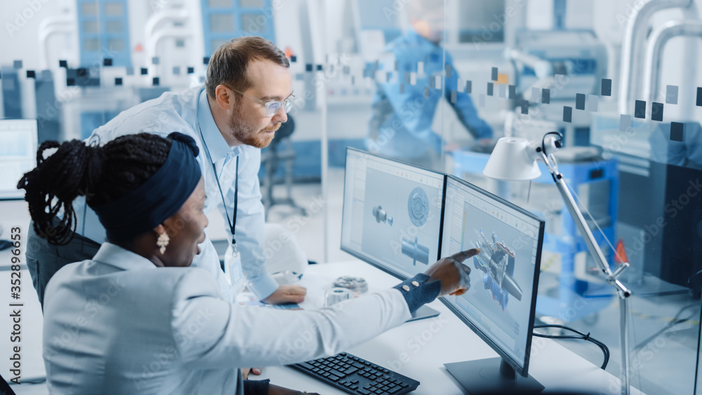 Poster modern factory: male project supervisor talks to a female industrial engineer who works on computer.