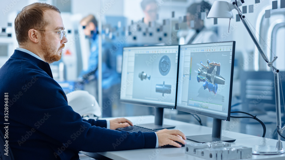 Fototapete Heavy Industry Engineer Working on Personal Computer, Screen Shows CAD Software with 3D Prototype of Zero-Emissions Engine. Industrial Factory with High-Tech CNC Machinery.