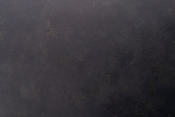 Black stone texture, dark slate background, top view