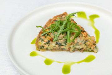 quiche an open pie with salmon. selective focus.