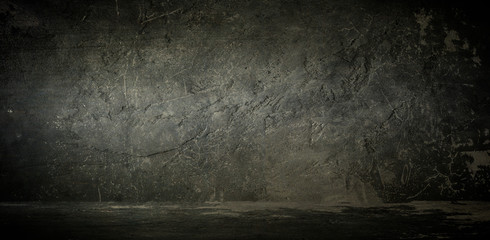 Empty photo studio with lighting equipment.