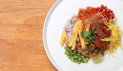 Shrimp Paste Rice Salad in the white round plate.