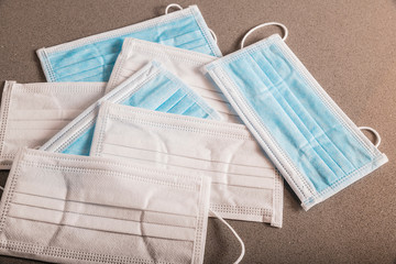 Medical face masks on grey background. Protection against coronavirus, flu and other respiratory...