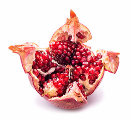 Stock Photo - Broken pomegranate segment isolated on white background cutout