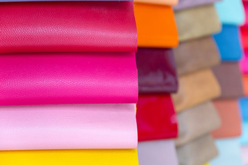 Colorful or multi colour piece of sample leather background texture