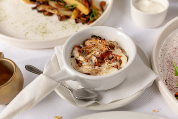 Chanterelle Mushroom Julienne on white background with spoon