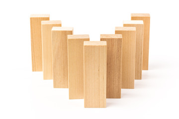 Domino effect, row of wood domino on white background