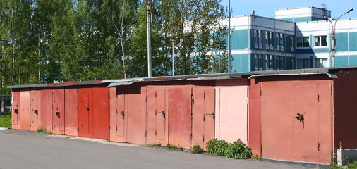 Row of brown metal garages, prospekt Bolshevikov, Saint Petersburg, Russia may 2020