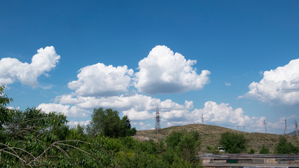 Blue sky, white clouds. Beautiful landscape.