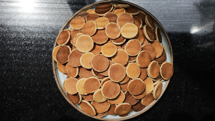 Traditional Dutch Mini Pancakes without any other ingredients with the black background