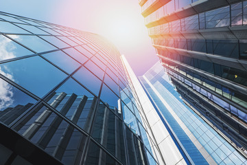 Big glass skyscraper in the city of London on sunny day.