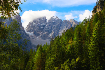 Fototapeta premium Beautiful summer landscape, fantastic alpine pass and high mountains, Dolomites, Italy, Europe. Out of focus.