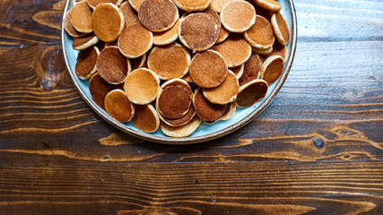 Traditional Dutch Mini Pancakes without any other ingredients with the black background