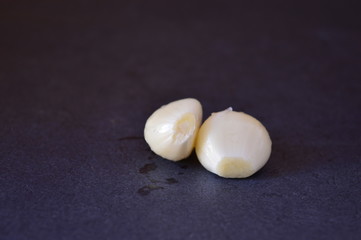 garlics on a black background