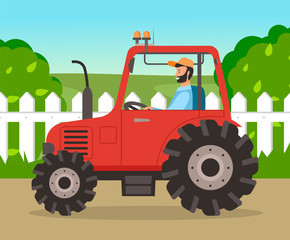 Obraz na płótnie Canvas Man is driving tractor on the road near the meadow . Bearded farmer is siting in agrimotor cabin on nature landscape. Agriculture driver profession, harvesting and cultivation in summer in countryside