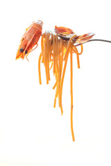 A forkful with spaghetti with crayfish and clam. White background.