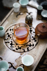 Tea ceremony set. Glass teapot and cups
