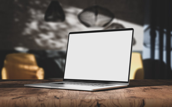 Laptop blank screen on wooden table in vintage living room interior, angled view - Powered by Adobe