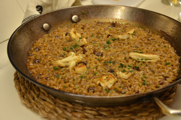 Paella is a Spanish rice dish originally from Valencia. Paella is one of the best-known dishes in Spanish cuisine.