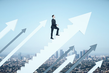 Obraz premium Businessman climbs the stairs in the form of white arrow
