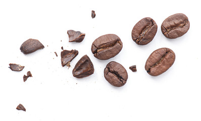 Broken roasted coffee bean with crumbs isolated on white background