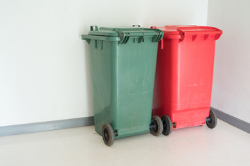 Green and red garbage bin in the hospital.Infection and general trash in the dental...