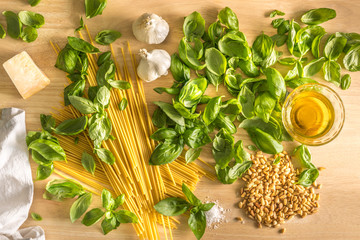 Obraz na płótnie Canvas Pasta pesto genovese, spaghetti, garlic, basil, pine nuts, parmigiao, olive oil and salt