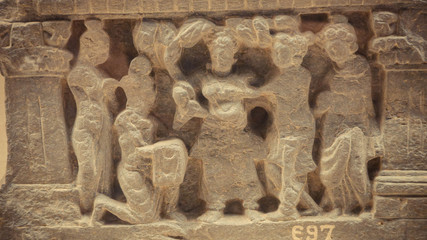 A close up of sculpture on the wall