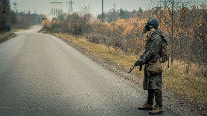 stalker with soviet gas mask in radioactive zone - obrazy, fototapety, plakaty