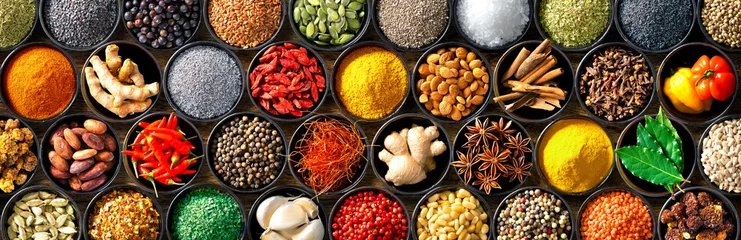 Foto auf Alu-Dibond Colourful background from various herbs and spices for cooking in bowls © Alexander Raths