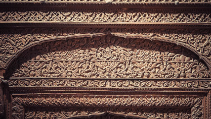 Close up of a detail engraved wood