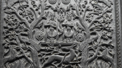 Close up of an engraved wood on wall