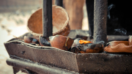Close up of candle clay holder in place