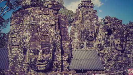 Close up of faces on monument wall