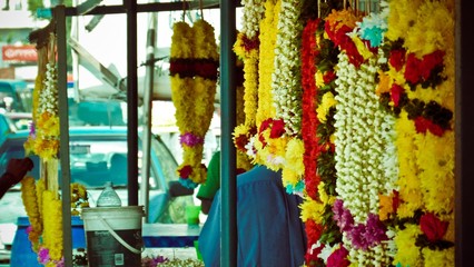 Fototapeta premium Close up of flowers tied together and hanged
