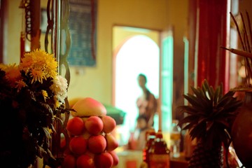 Close up of flowers and food on table