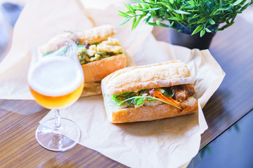 beer glass and baguette sandwich for staying at home