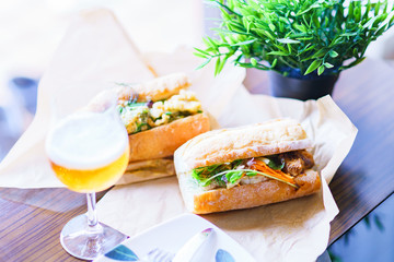 beer glass and baguette sandwich for staying at home