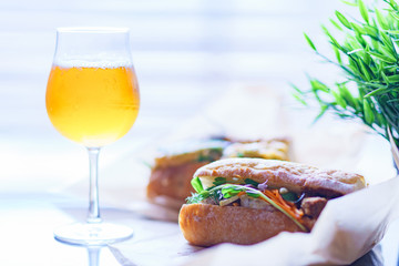beer glass and baguette sandwich for staying at home