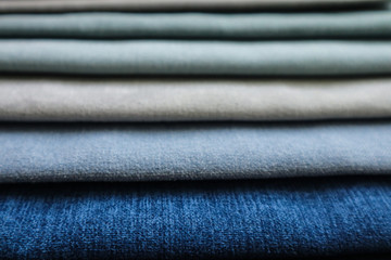 Composition with samples of clothes as background