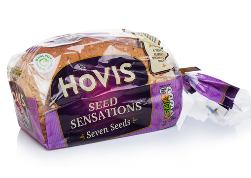 LONDON, UK - OCTOBER 10, 2019: Loaf of HOVIS seeded bread on white background.