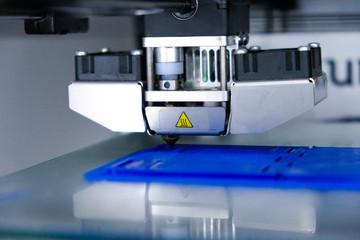 An image of a 3d printer while printing