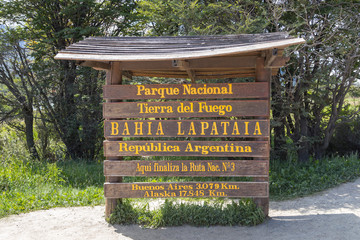 End of Pan-American highway - wooden road sign near End of the World, Lapataia bay in Tierra del...