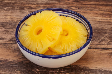 Marinated pineapple rings in the bowl